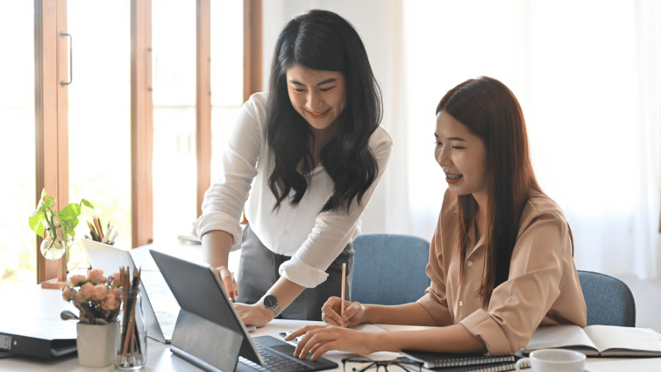 new manager leading former peers in a professional workplace